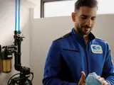 Kinetico service person checking on equipment to make sure it's working properly.